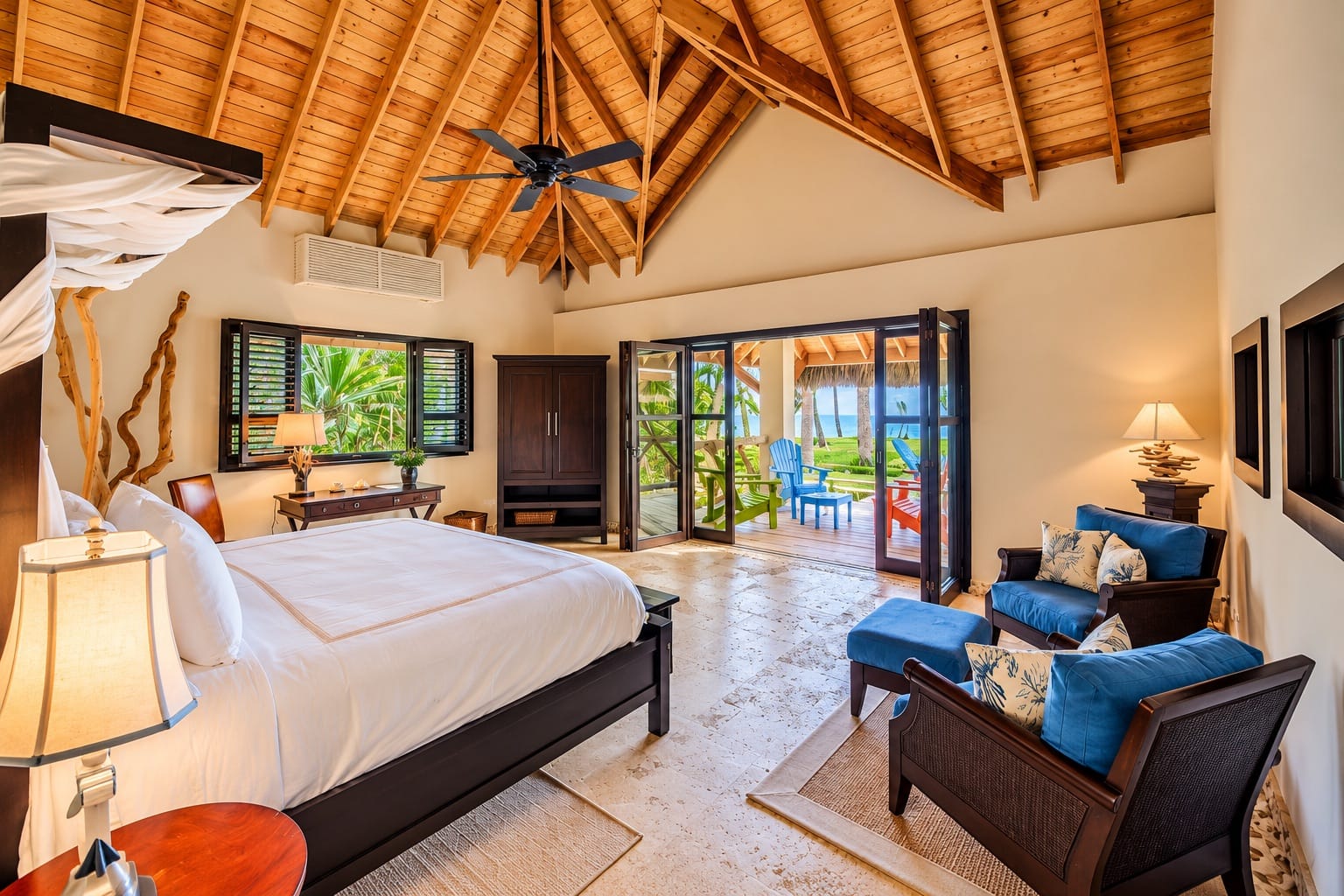 Master suite with king bed and doors opening onto the garden