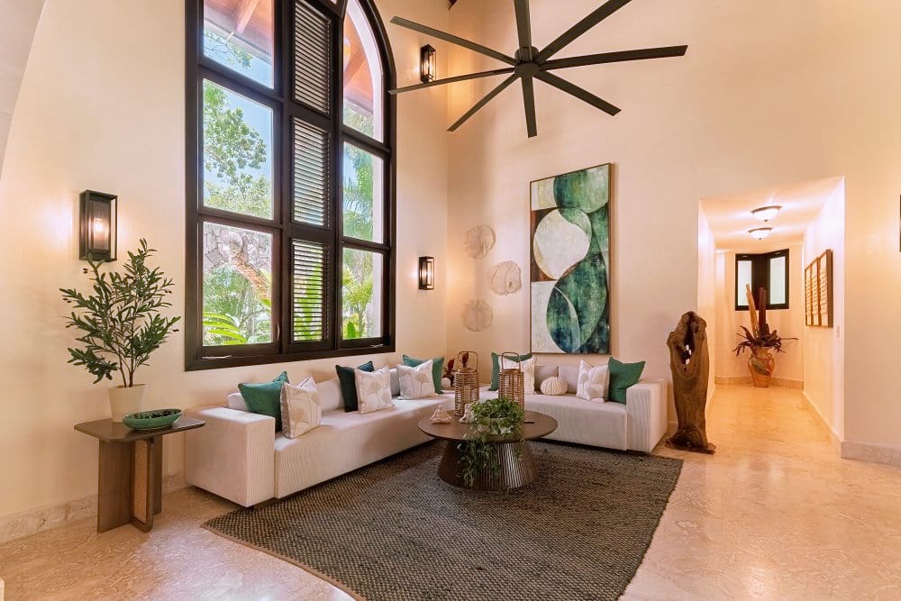 Living room with tall arched windows