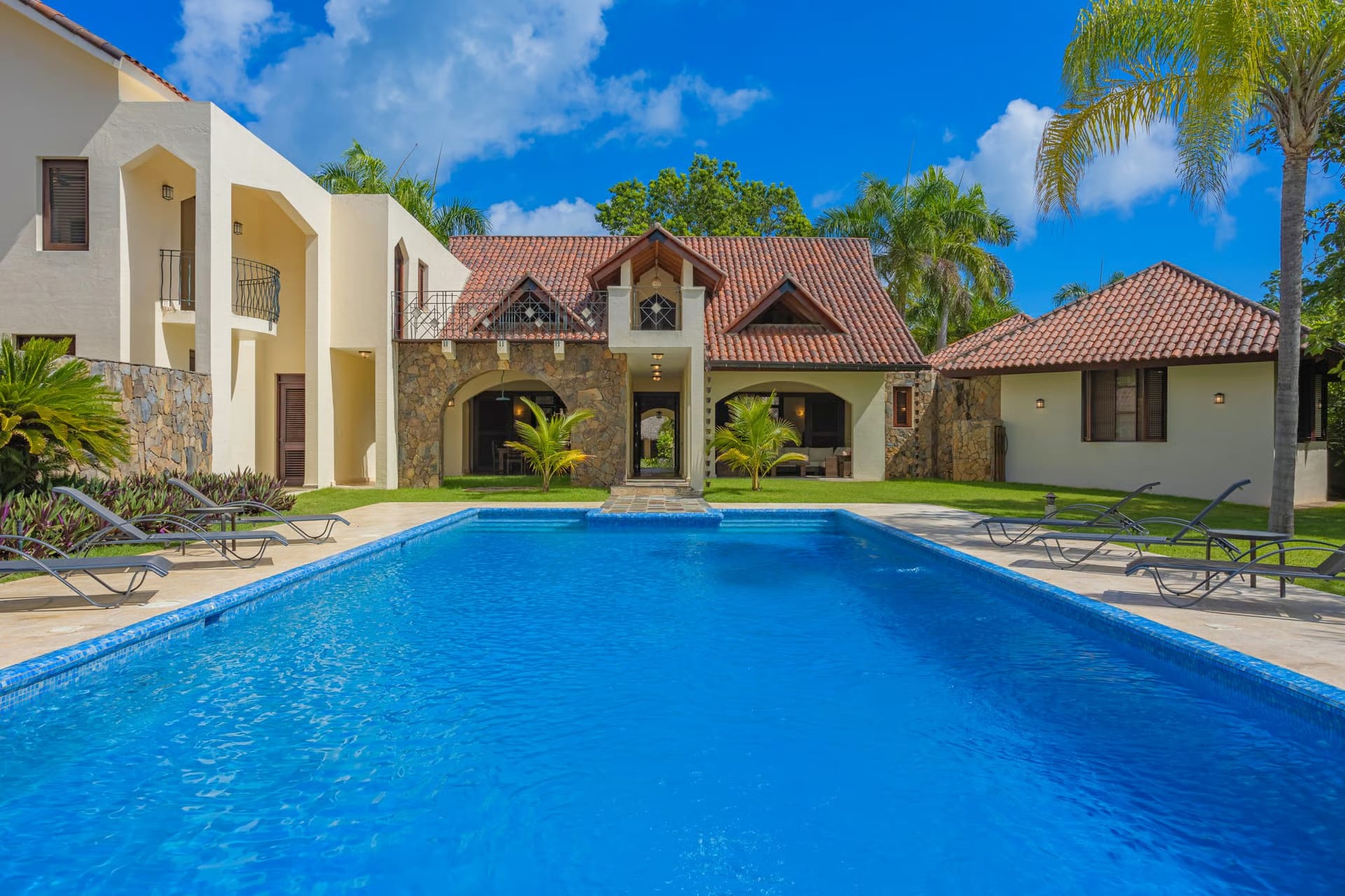 Villa Serena’s facade behind the large private pool