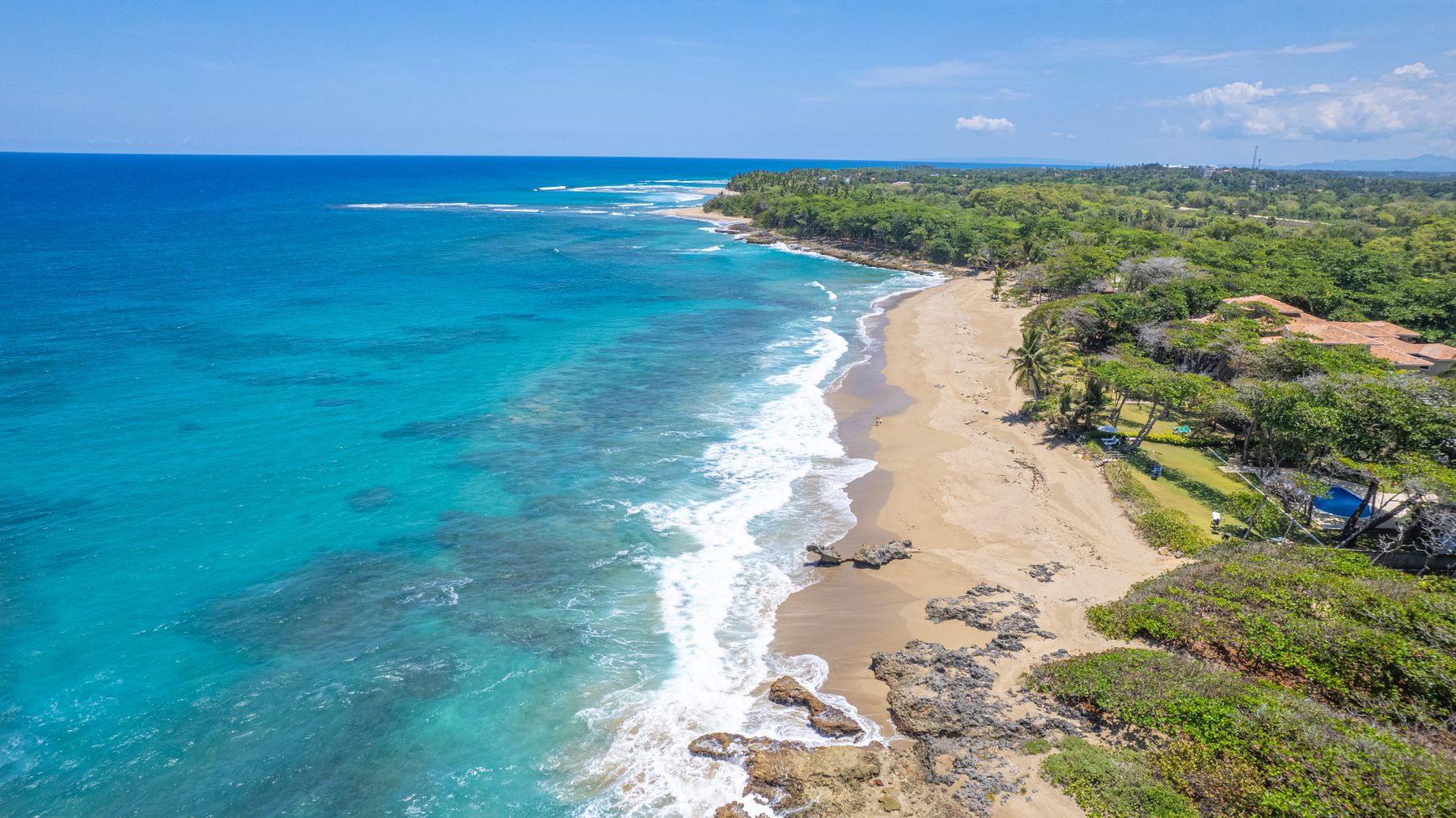 Perla Marina beach and turquoise water, a short walk from the villa