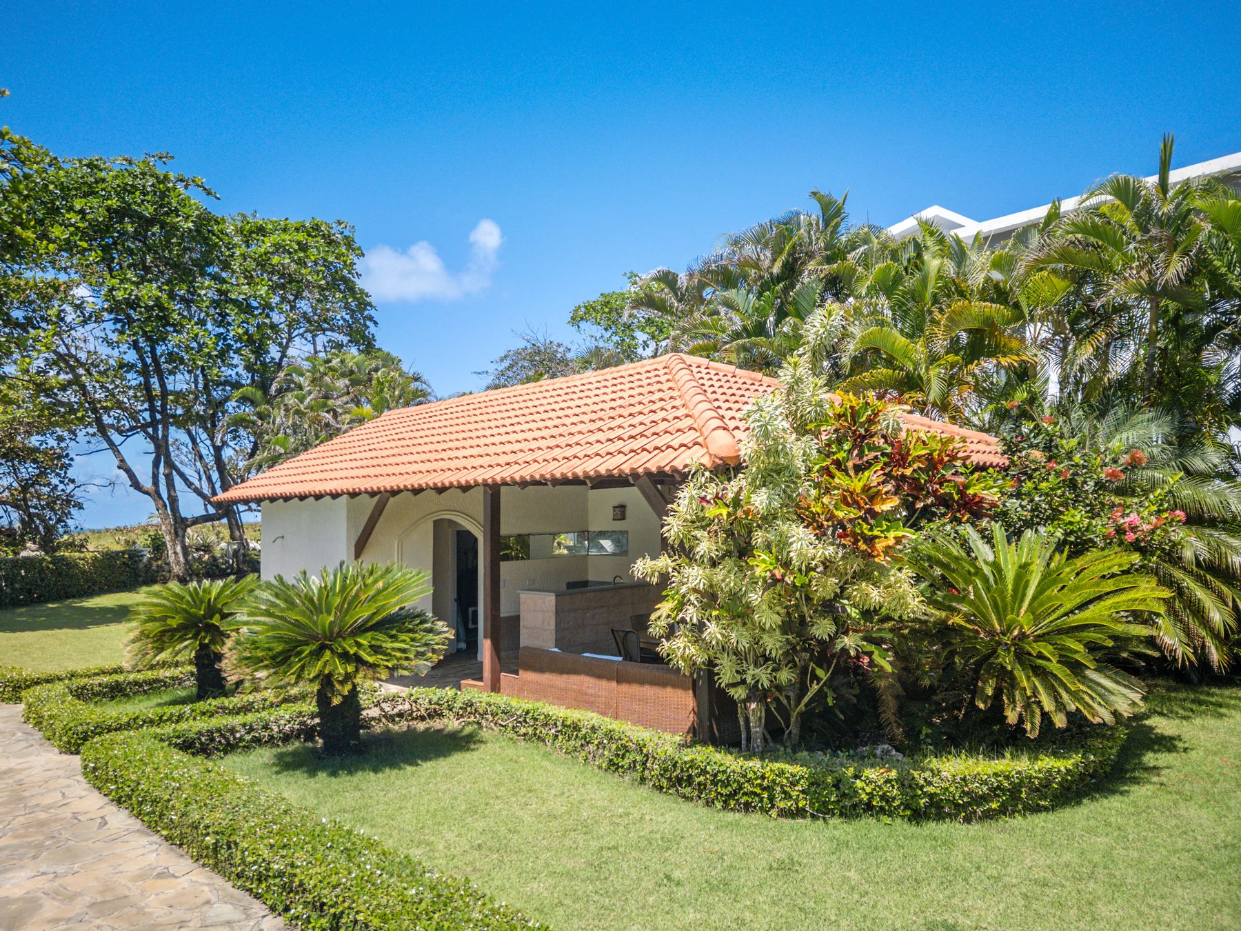 Pool house in the tropical garden